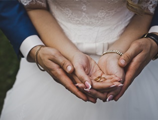 couple with hands together